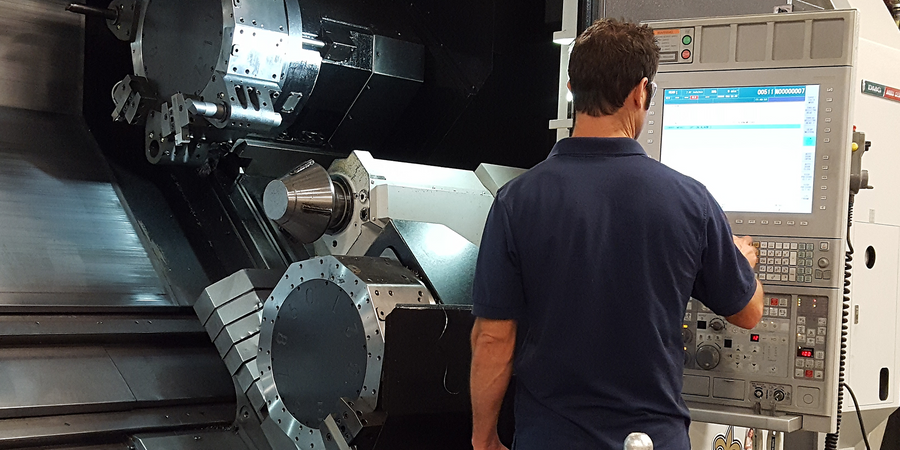 Johnny Pinell at the CNC machine in Houma, Louisiana